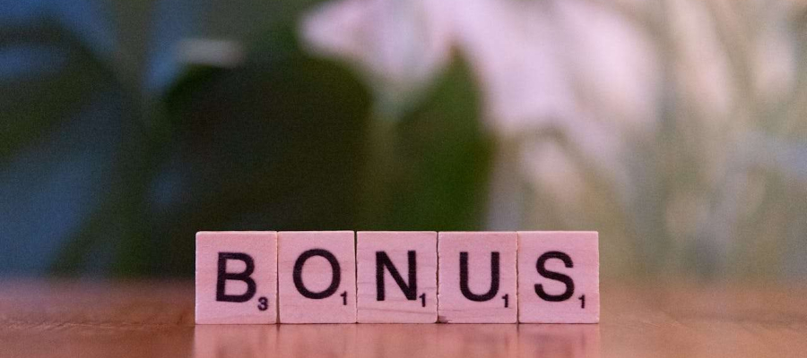 wooden blocks displaying the word bonus
