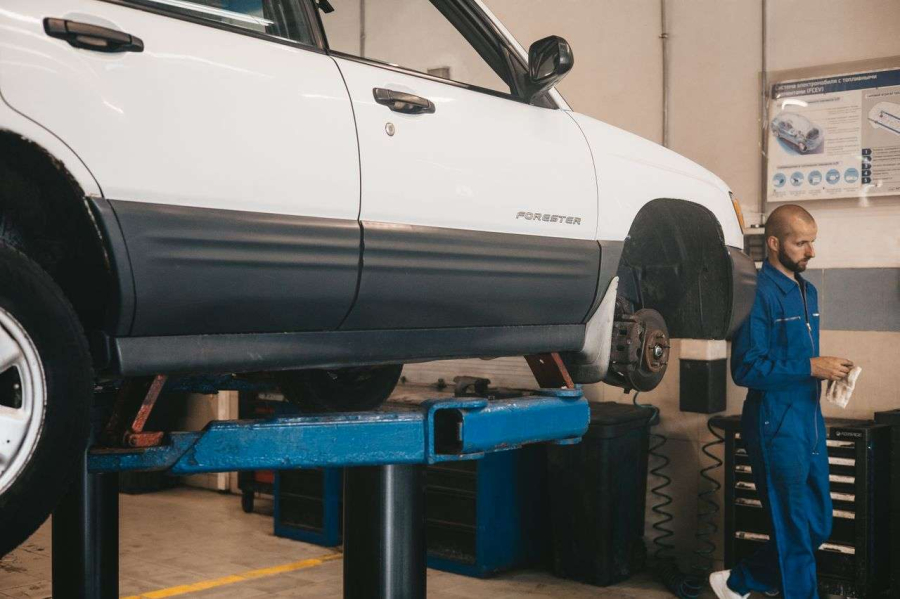 a car in a garage getting fixed