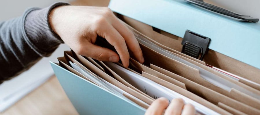 A person filing a group of reports