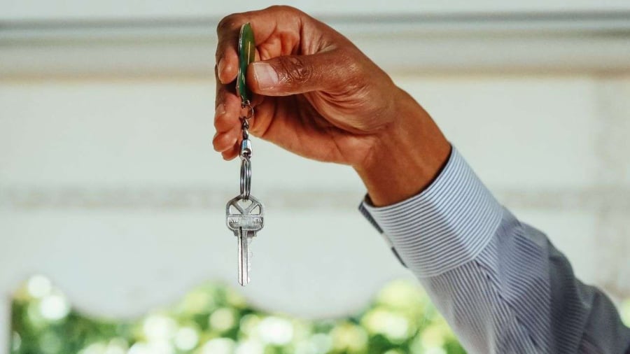 a hand holding keys