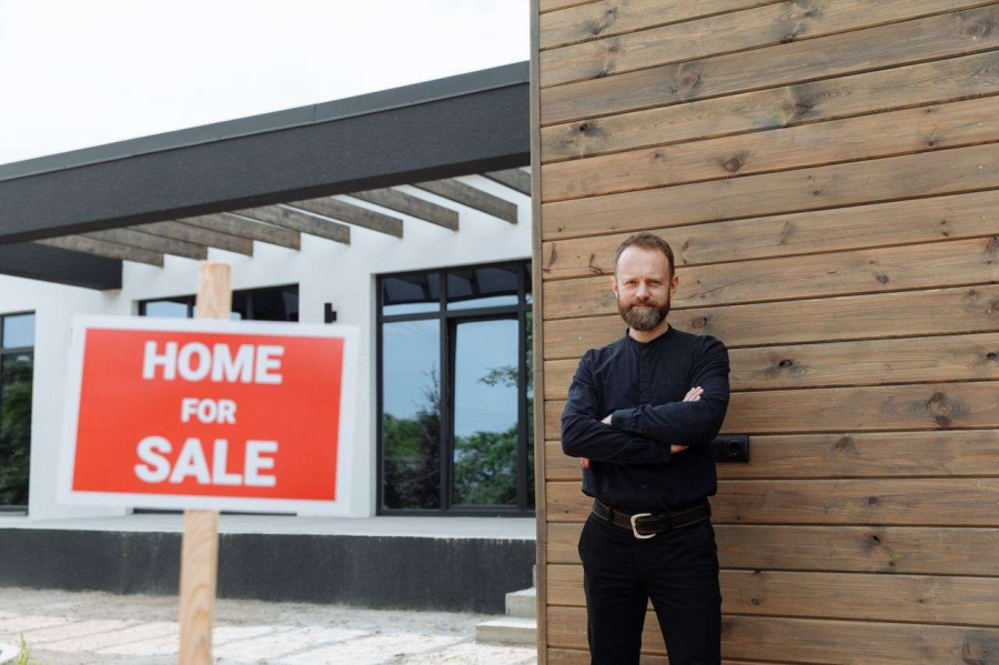 a man selling a house