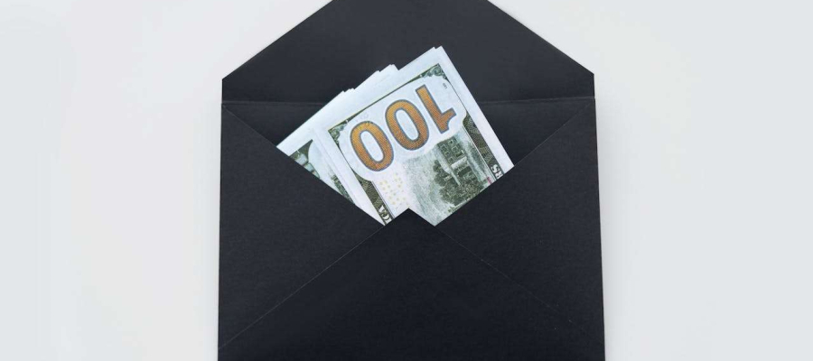money in a black envelope