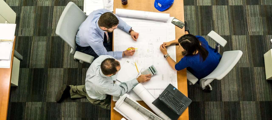 people having meeting around table