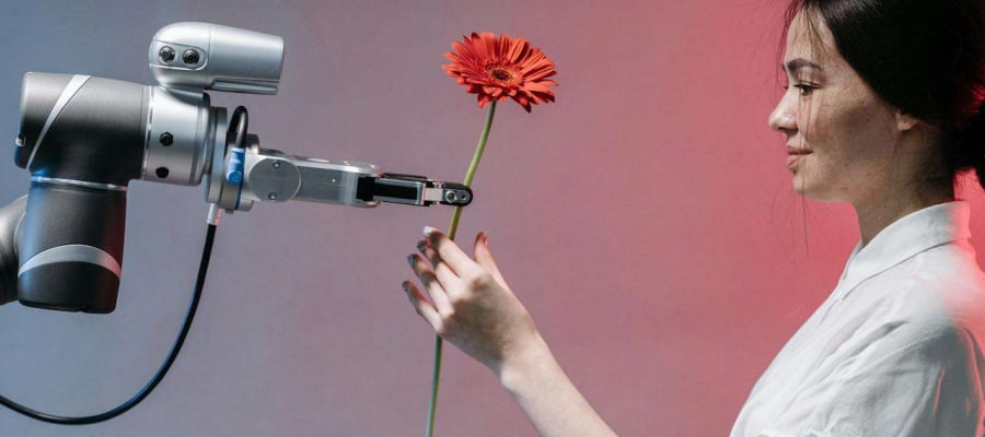 robot giving a flower to a girl.