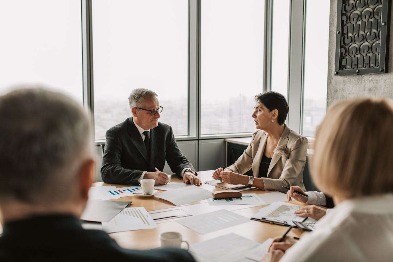 a meeting room filled with people