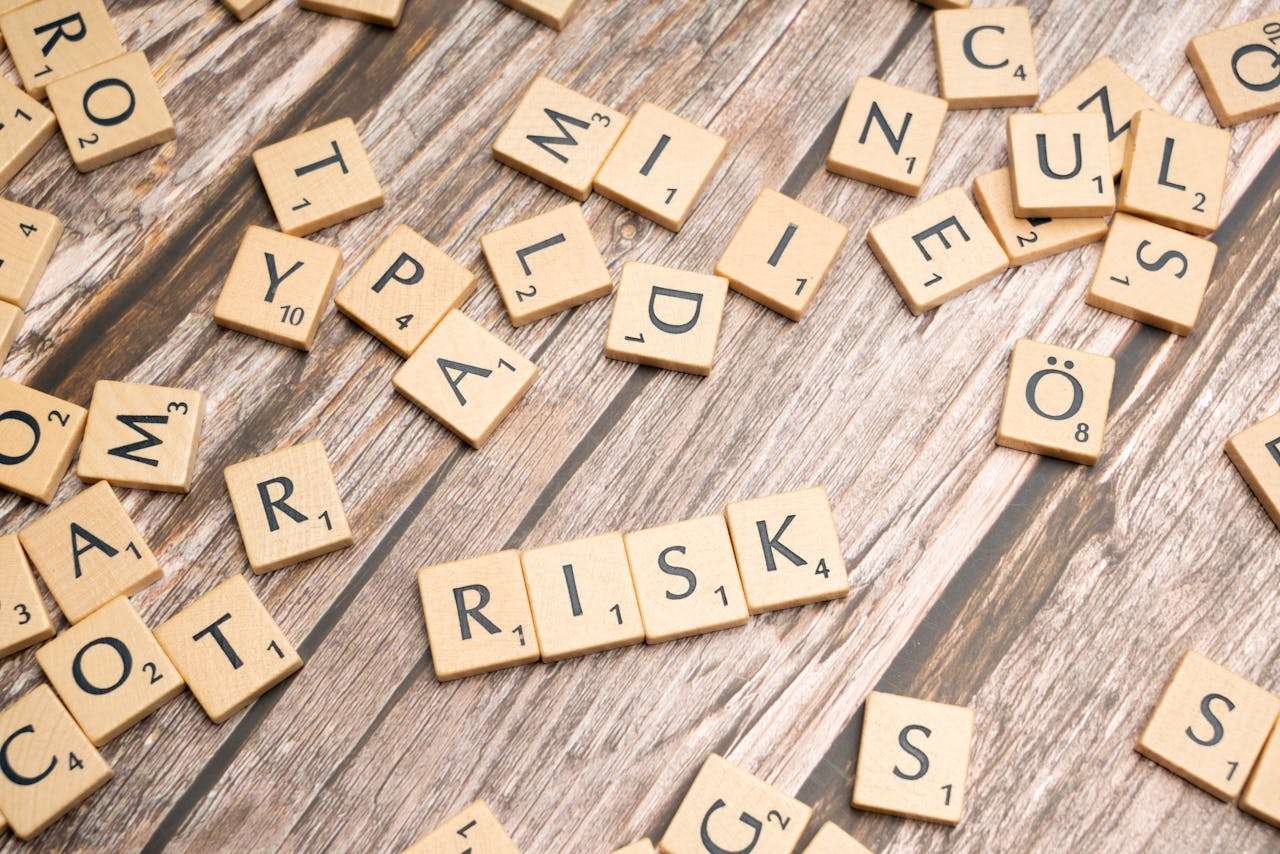 wooden blocks showing the word risk