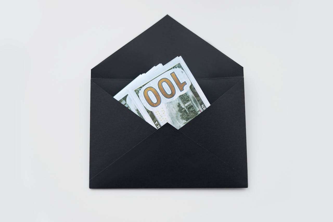 money in a black envelope