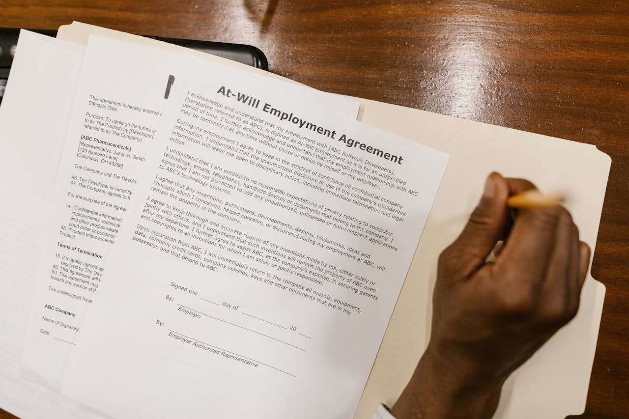 documents showing an agreement for employment