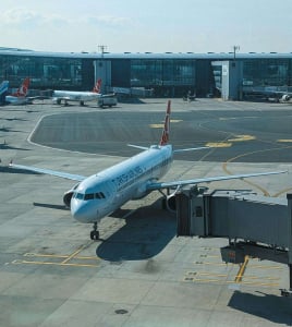 a plane waiting at an airport