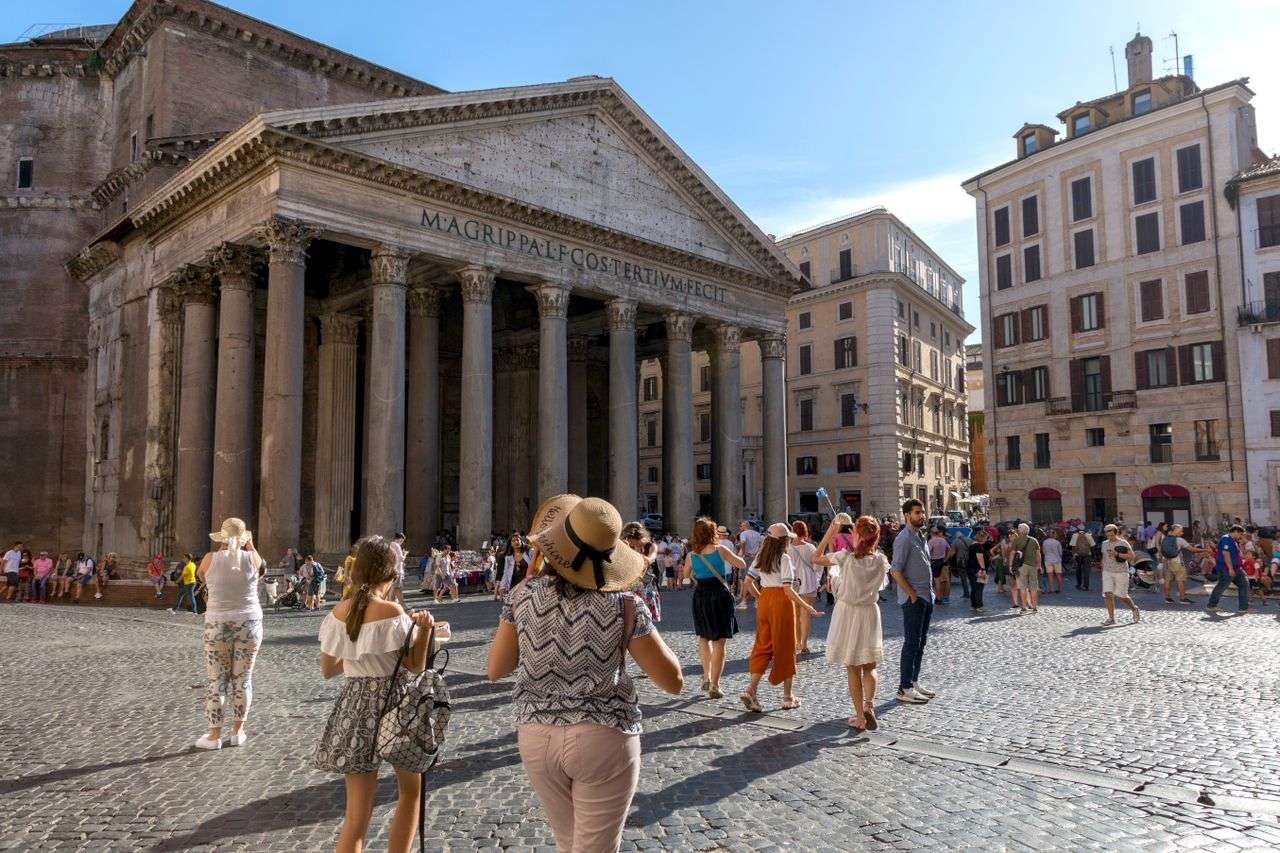Tourists exploring the pantheon in rome